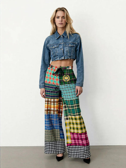 Black Queen in Afrocentric Technicolor Plaid Eco-Poly Wide Leg Pants