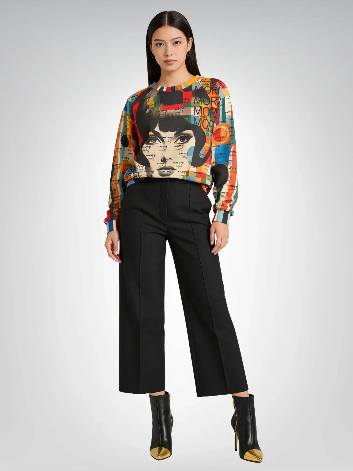 Pop art Beatnik Girl graphic sweatshirt worn with black cropped trousers and black ankle boots with gold tips