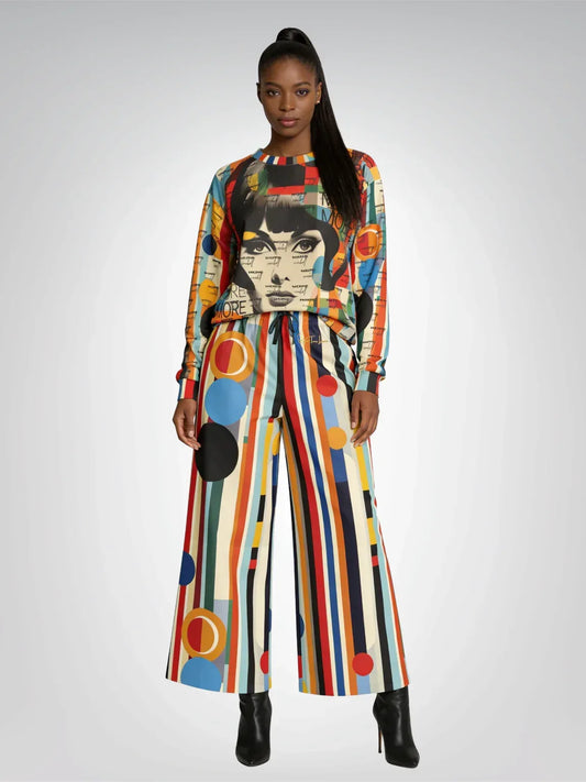 The More Cowbell Girl Retro Chic Striped Wide Leg Pants paired with pop art graphic sweatshirt