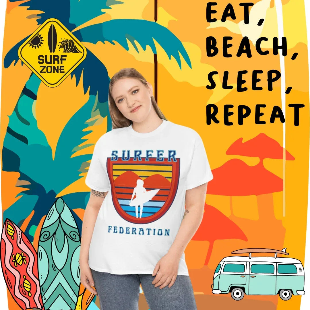Graphic surfer T-shirt with retro beach design worn by model, featuring surfboards, palm trees, and coastal artwork background.