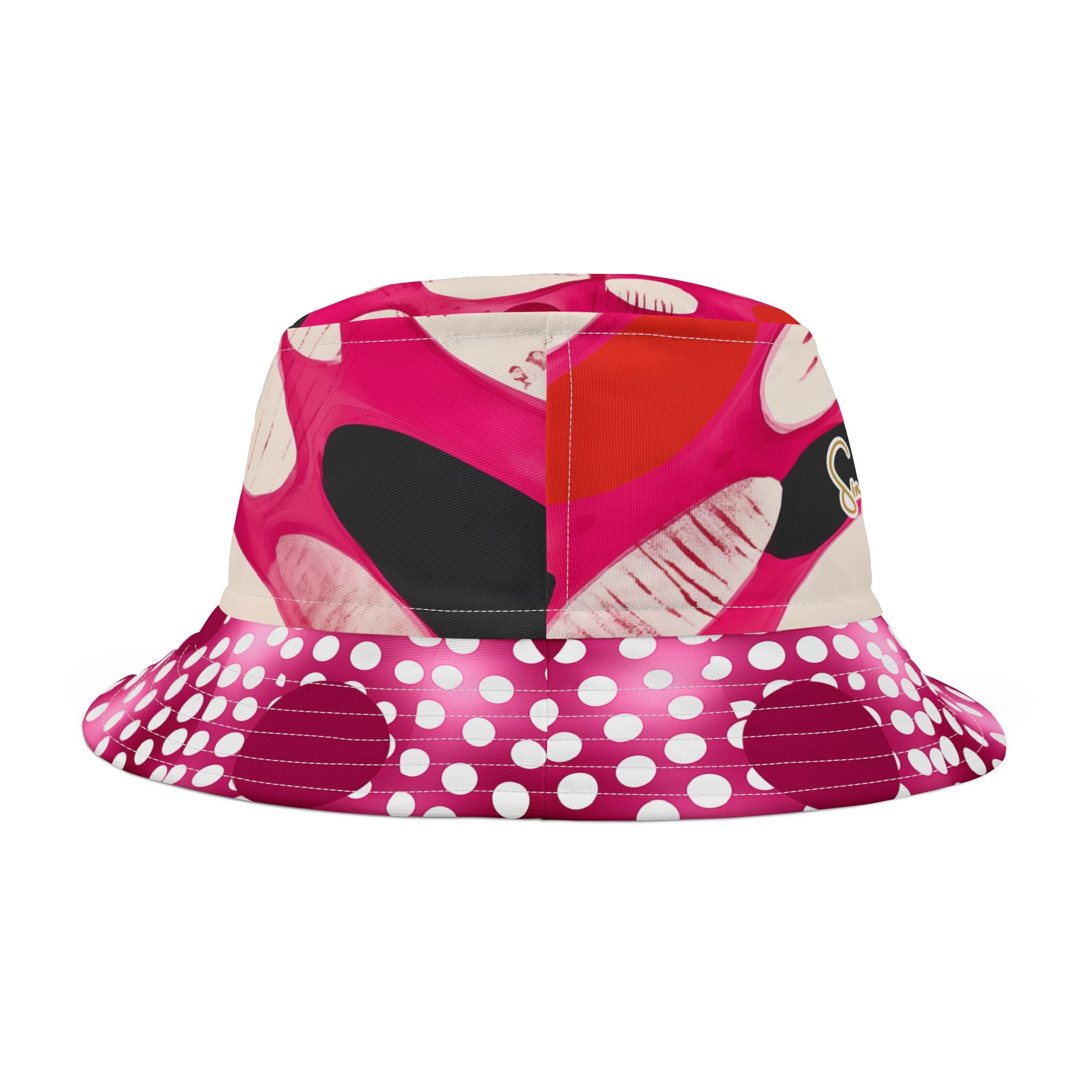 Back view of a pink bucket hat with abstract pattern and white polka dots on a white background
