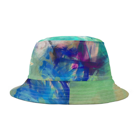 Colorful bucket hat with abstract brushstroke design in blue, purple and green on a white background
