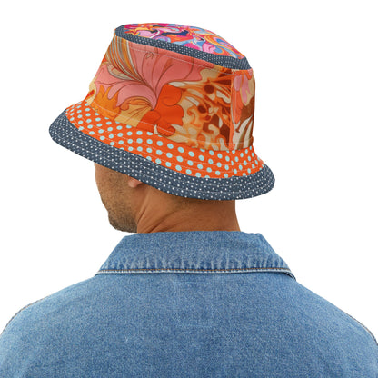 Person wearing a colorful bucket hat with floral design on a white background