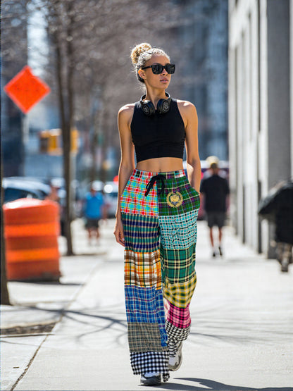 Black Queen in Afrocentric Technicolor Plaid Eco-Poly Wide Leg Pants