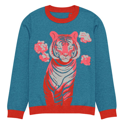 Blue sweater with a red tiger design on a white background